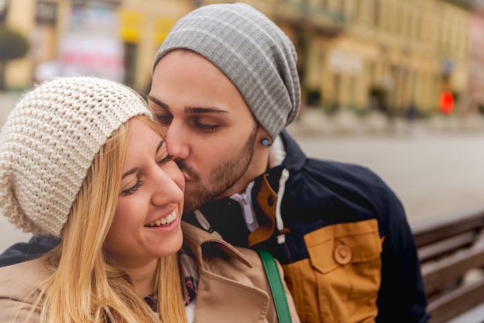 Dating-an-Addict-in-Recovery-How-to-Make-Your-Relationship-Stronger - young couple with stocking caps